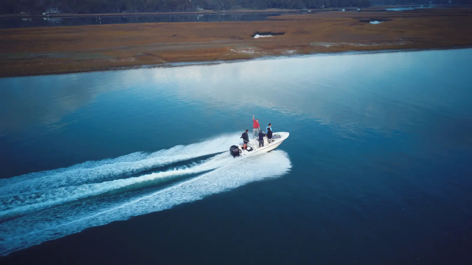 Guests cruising by boat near Mason Inlet