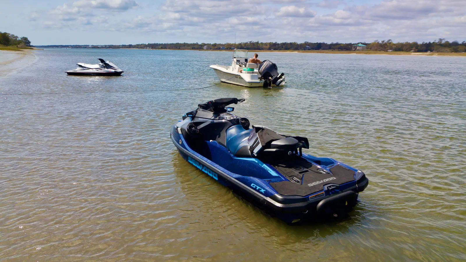 Boaters gathered on the sandbar at Masonboro Island
