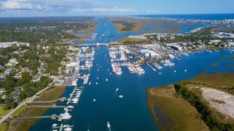 Aerial view of boats cruising Wilmington's waterways
