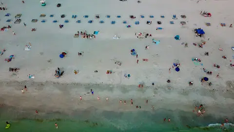 Sunbathers on the beach near Wrightsville Beach